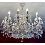 A vintage 12 branch chandelier of impressive size and sparkle.