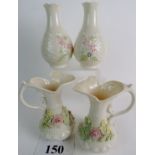 Two pairs of Belleck porcelain vases, 19cm x 15cm high.