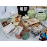 A collection of dolls' house items to include model ship, book case & books, drum, mantel clock,