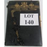 An Edwardian/Art Nouveau photograph album containing approximately 36 portrait photographs (a/f).