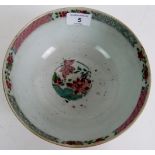 An 18th century Chinese footed bowl, decorated with the famille rose palate on a white ground,