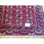 An early 20's Persian rug, with repeated pattern to the centre. 138 cm x 115cm.