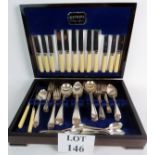 A vintage canteen of silver plated and bone handled cutlery.