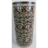 A 20th century Chinese umbrella stand decorated with various flowers, autumnal colours,