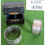 A pair of silver napkin rings, hallmarked Chester 1914, in original box, weigh 21.