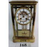 A 19th century four-glass striking mantel clock with mercury pendulum,