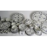 A Royal Doulton dinner service for 6 + 1 settings, includes teapot, tureens, dinner plates,