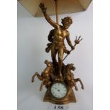 A decorative 19th century cast gilt-metal table lamp / clock, in the form of Neptune,