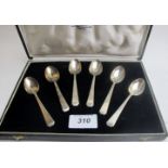 A set of 6 silver teaspoons marked stirling, approximately 3.4 troy oz/105 grams, boxed.