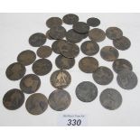 A collection of old English bun pennies and later Victorian pennies.