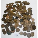 A large collection of old English pennies and half pennies, mainly Edwardian.