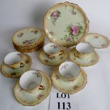 A late Victorian style blush ivory part tea service decorated with pink roses,