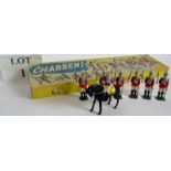 A box of Charbens metal toys, containing six guardsmen with swords drawn, plus a mounted officer,