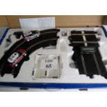 A Scaletrix Rally Stage with a Mini Countryman WRC and a Ford Fiesta RS WRC, in original box,