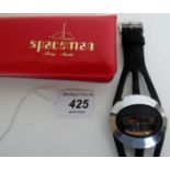A Swatch Spaceman Swiss made watch, manual wind, fibre glass watch, in red case,