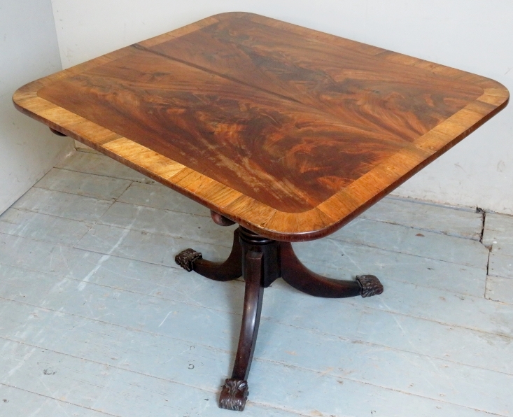 A William IV rectangular tilt top table with a rosewood banded and flame mahogany top over a turned - Image 2 of 8