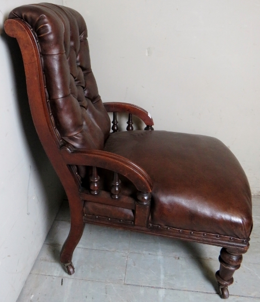 A Victorian mahogany framed armchair upholstered in brown button backed leather, - Image 2 of 4