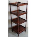 A large 19th Century four tier mahogany whatnot with turned finial's to top over a single drawer to