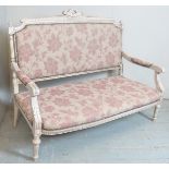 A 20th Century French style two seater settee with grey painted frame and floral upholstery.