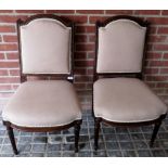 A pair of rosewood framed occasional chairs, with gilt highlights and upholstered in cream material,