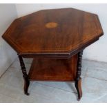 An Edwardian inlaid rosewood hexagonal centre / occasional table with a lower shelf and turned