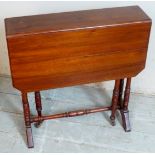 A small 19th Century mahogany drop leaf Sutherland table terminating on turned upright supports