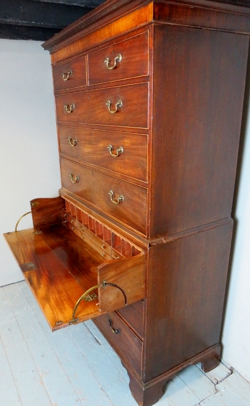 A Georgian mahogany secretaire chest on chest with two short over three long drawers to top and