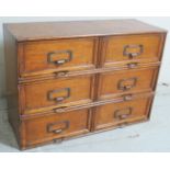 A 20th Century vintage oak table top or wall hanging filing cabinet with six drawers each having