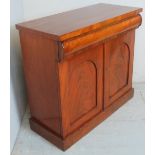 A Victorian mahogany Chiffonier sideboard with a long blind drawer over two cupboard doors with