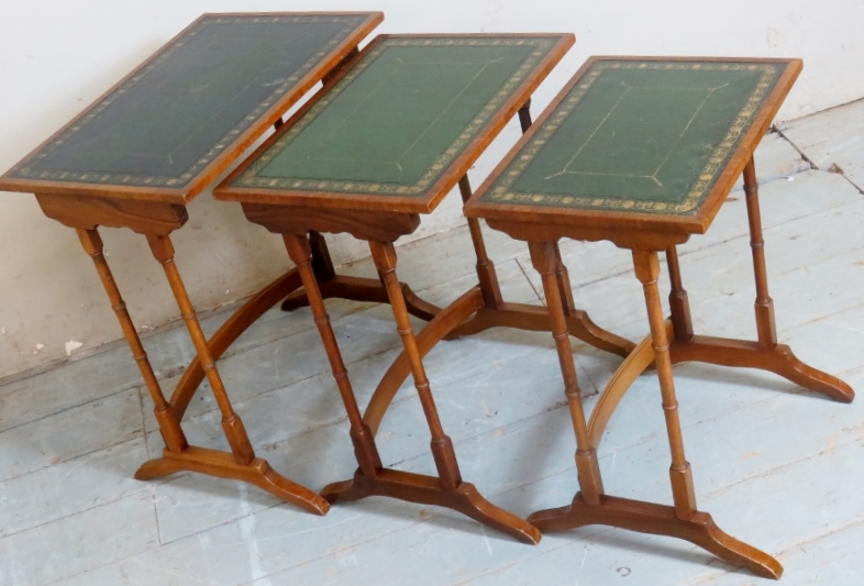 A nest of three 19th Century walnut graduated tables with inset tooled leather tops. - Image 2 of 2