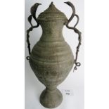 A large Indian brass twin handled jar wi