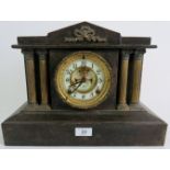 A slate mantel clock by The Ansonia Cloc