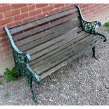A vintage slatted garden bench with deco