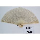 An antique Chinese carved Ivory fan, length is 20cm, span 36cm.