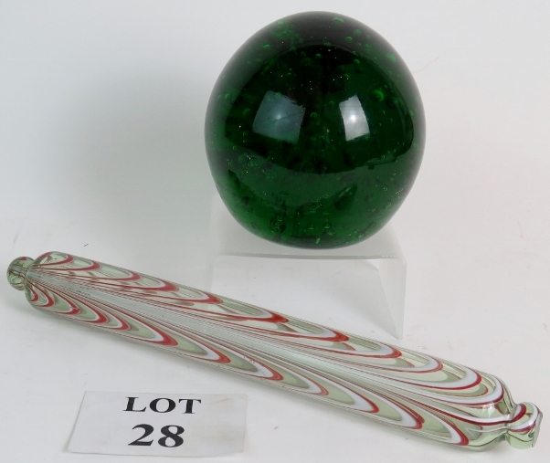 A 19th Century nailsea glass red and white rolling pin and large Victorian green glass dump,