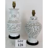 Two Blanc De Chine reticulated porcelain table lamps on turned wood bases, tallest 28.5cm.