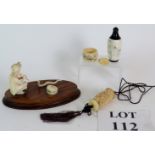 An antique ivory snake charmer on rosewood base, erotic Chinese bone snuff bottle,