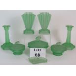 Art Deco opaque green glass eight piece dressing table set with fan design.