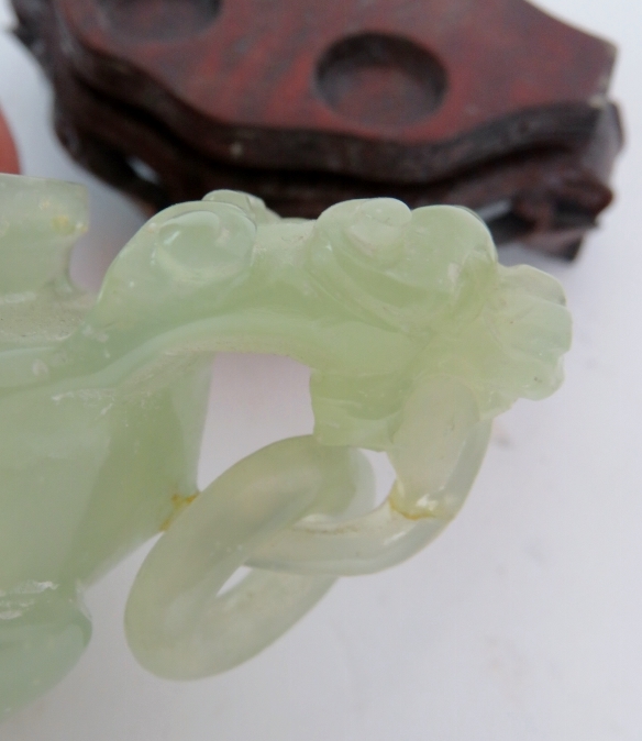 A Chinese carved jadeite dragon censer on carved wooden stand. Height: 15cm. - Image 4 of 4