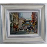 Ivan Taylor (b1946) - `Chinatown, Manchester', oil on board, signed, gallery labels verso,