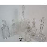 Six cut glass drinks decanters, 19th Century and later.