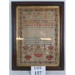 A Victorian needlework sampler, dated March 12th 1862, in a period frame with gilt mount.