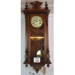 A 19th Century Vienna style wall clock in mahogany veneer case.