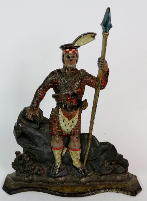 A mid 19th Century cast iron Scottish soldier door stop in original polychrome colours. - Image 2 of 9