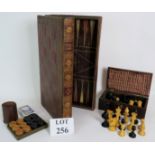 A vintage Staunton style chess set in antique mahogany box, with a set of 48 draughts,
