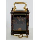 A rare late 19th Century Drocourt miniature tortoiseshell carriage clock, serial No 18609.