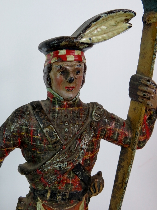 A mid 19th Century cast iron Scottish soldier door stop in original polychrome colours. - Image 9 of 9