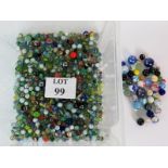 A large quantity of glass marbles including some Victorian. Largest 3.4cm diameter.