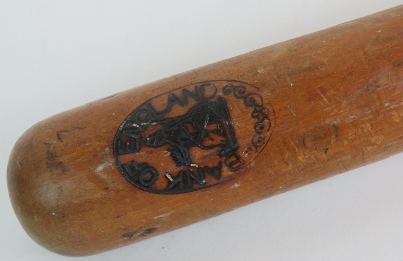 A selection of Treen items to include a truncheon marked Bank of England, a pair of butter paddles, - Image 3 of 4