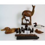 A collection of 15 vintage carved wood objects and a ceramic duck, including ducks,